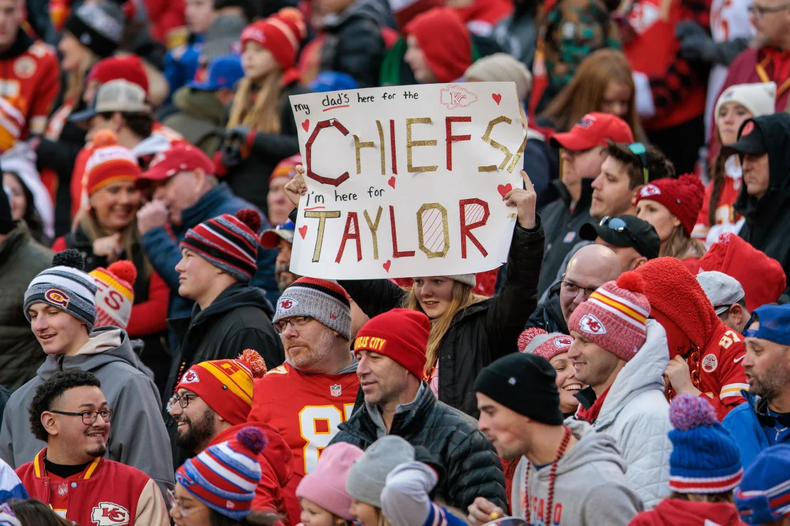 Kansas City Chiefs fans hold up a Taylor Swift sign during at Arrowhead Stadium in Kansas City in December.